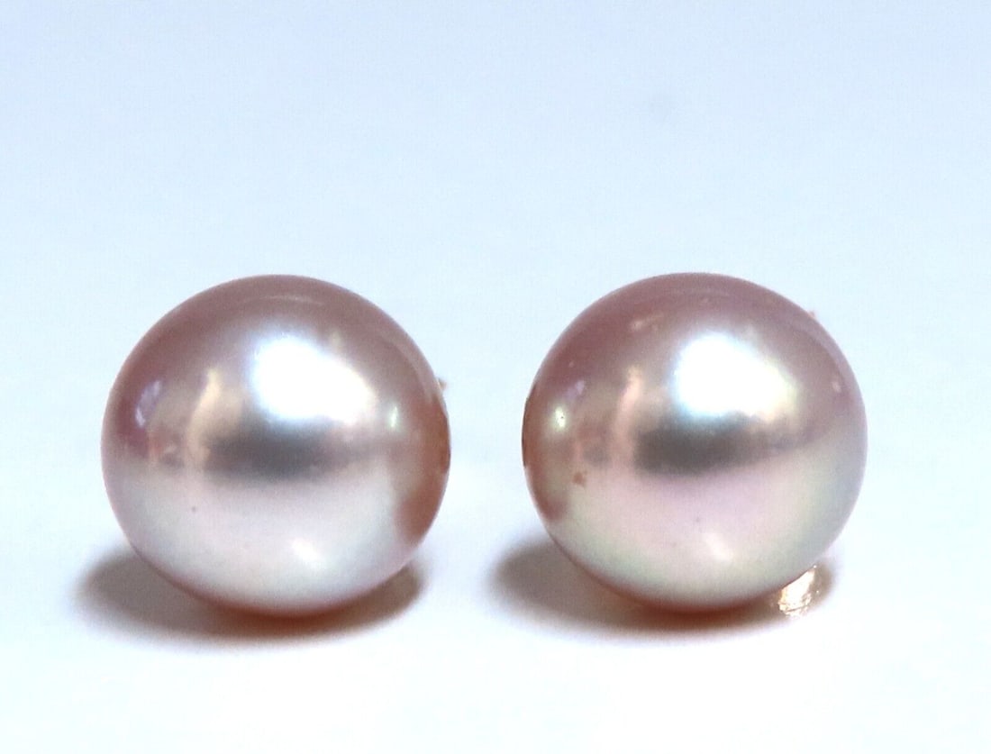6.5mm Fresh Water Stud Earrings 14kt: Freshwater Pink Pearl stud earrings. 6.5mm Pearl 14 karat white gold 1 grams Comfortable Butterfly . Reserve: $120.00 Shipping: Domestic: Free shipping to anywhere within the contiguous U.S. Internati