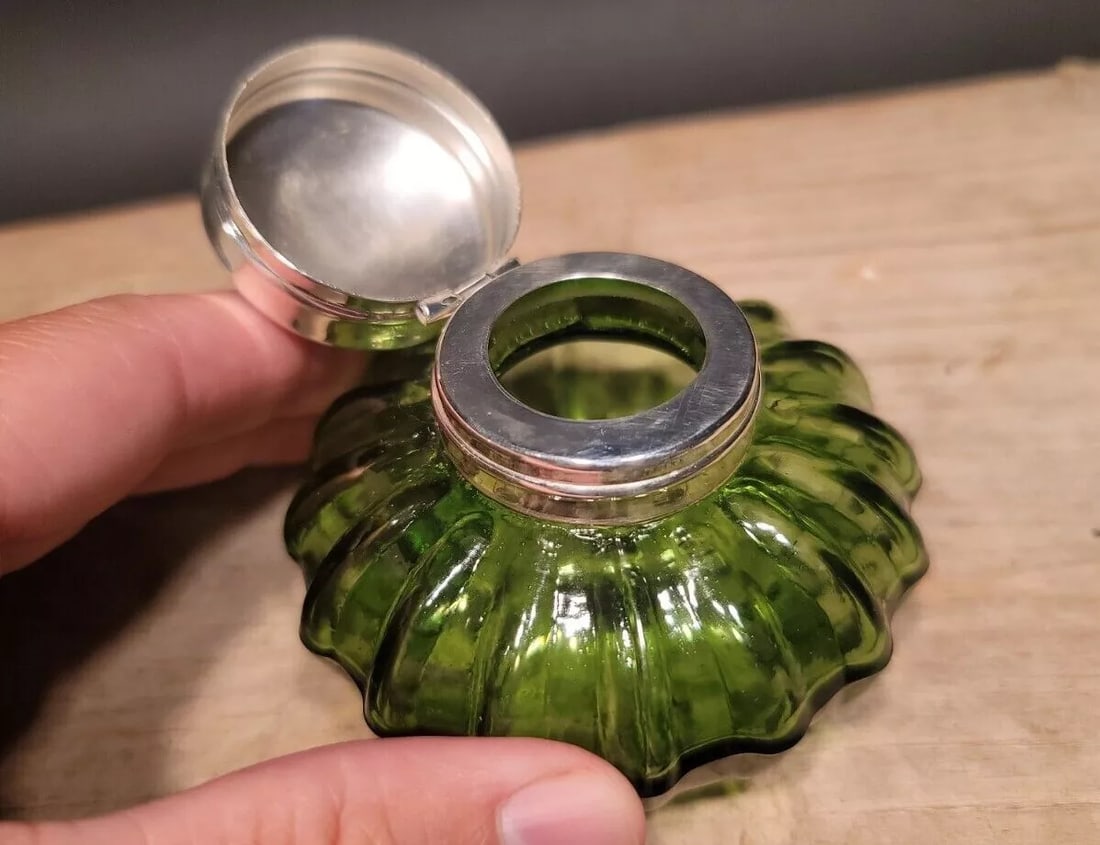 Round Clear Glass Thick Glass Inkwell Ink pot Bottle: Vintage Antique Style Round Solid Green Glass Inkwell Ink pot Description 2 1/4" High x 3 1/8" wide Charming Reproduction antique green glass inkwell ink bottle. Charming with subtle signs of being ha