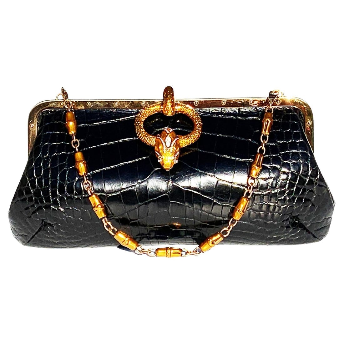 New Tom Ford for Gucci S/S 2004 Limited Edition Black Crocodile Enamel Snake Bag: About the Item New Tom Ford for Gucci Limited Edition Black Crocodile Bag S/S 2004 Collection Crafted from crocodile skin, Bronze tone metal frame, Enamel clam closure finished with a large bronze ton
