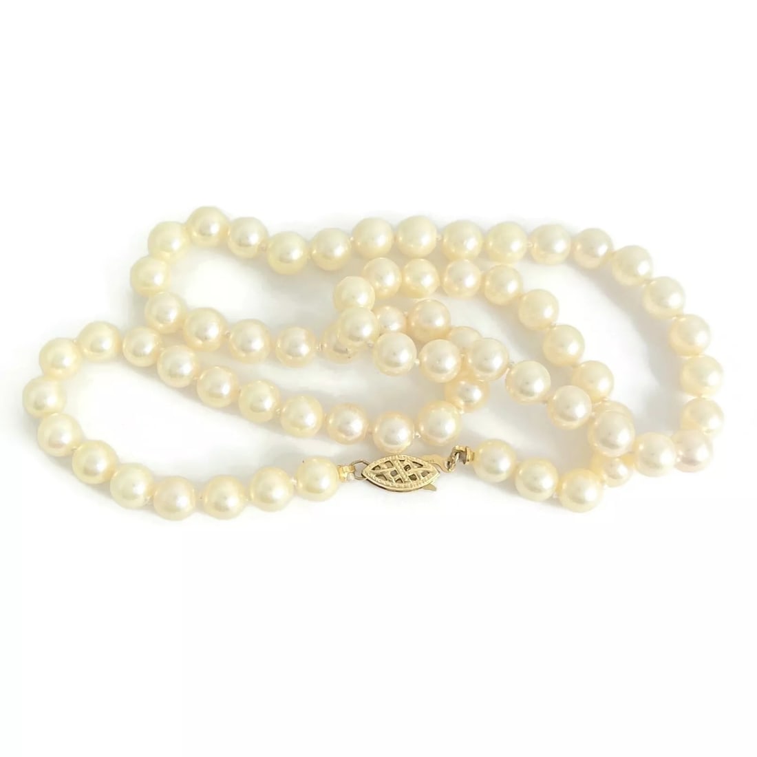 Japanese Pearl Necklace 14K Yellow Gold Clasp 18 Inches, 6.4 mm, 23.26 Grams: Japanese Pearl Necklace 14K Yellow Gold Clasp 18 Inches, 6.4 mm, 23.26 Grams This is a gorgeous classic pearl necklace! Please let us know if you have any questions. Pearls: 66 Japanese cultured pearl