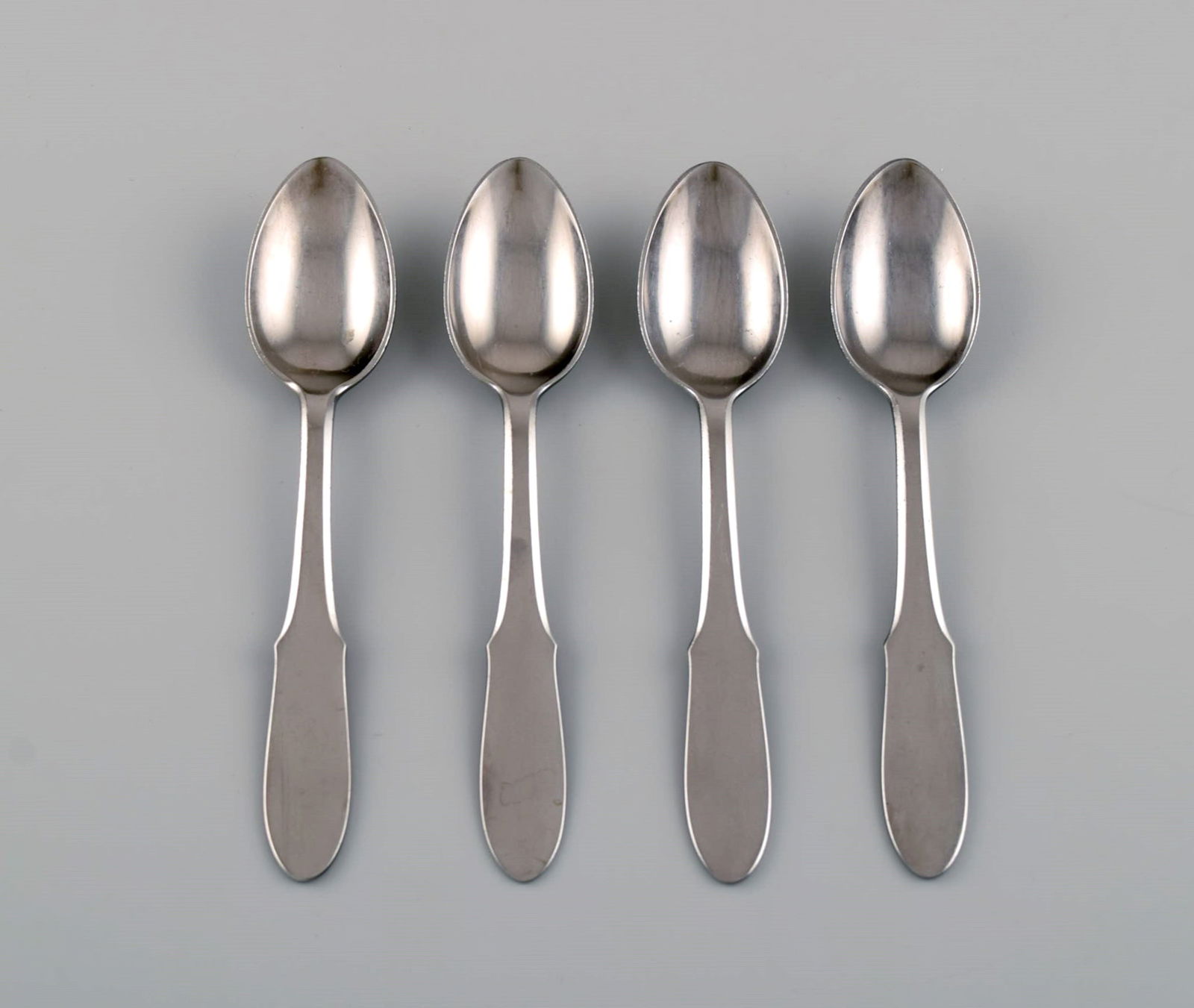 Gundorph Albertus for Georg Jensen. Four Mitra teaspoons in stainless steel. 1970s.: Title: Gundorph Albertus for Georg Jensen. Four Mitra teaspoons in stainless steel. 1970s. Description: Gundorph Albertus for Georg Jensen. Four Mitra teaspoons in stainless steel. 1970s. Length: 13 c