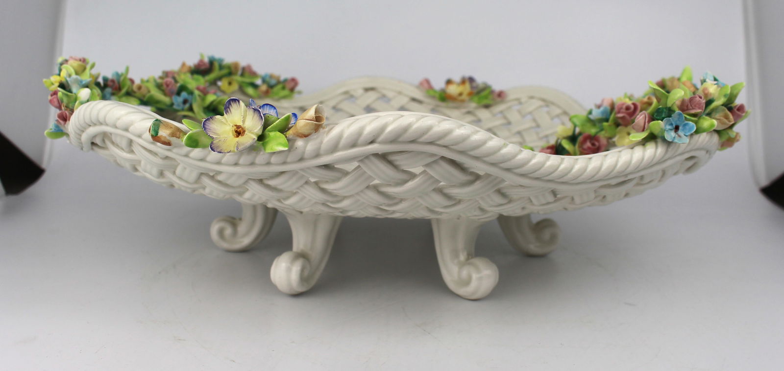 Vintage Capodimonte Flower Encrusted Centrepiece Bowl: Vintage Capodimonte Flower Encrusted Centrepiece Bowl. Mid 20th century. Very good condition; a few small nibbles to flowers only Reserve: $64.00 Shipping: Domestic: Flat-rate of $70.00 to anywhere wi