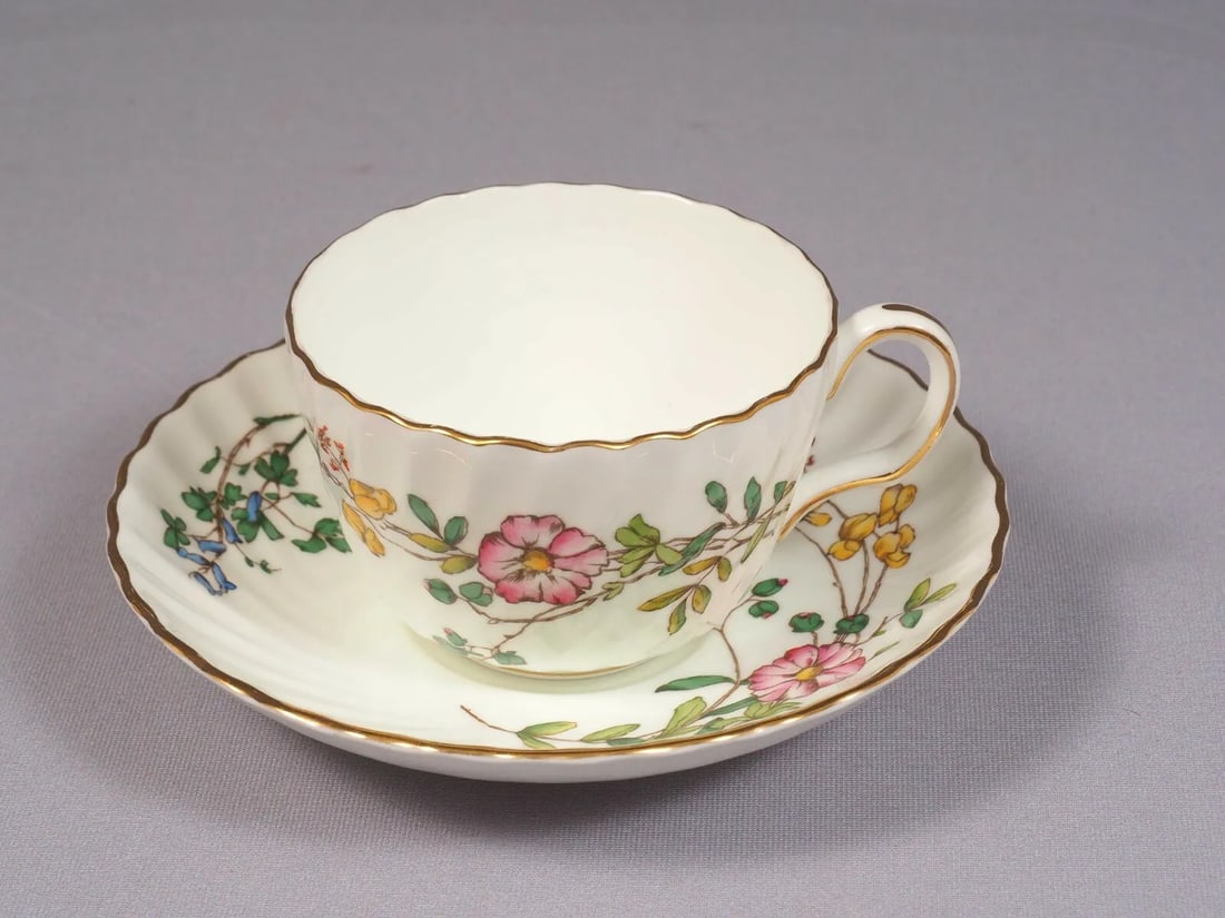 Minton Dainty Sprays S-511 Coffee Tea Cup Saucer England Vintage: This is a stunning Coffee/Tea Cup and Saucer set made by Minton in England. The set is in Dainty Sprays Pattern - S-511 It has pink, yellow and blue flowers and swill rim This is very rare set and ver