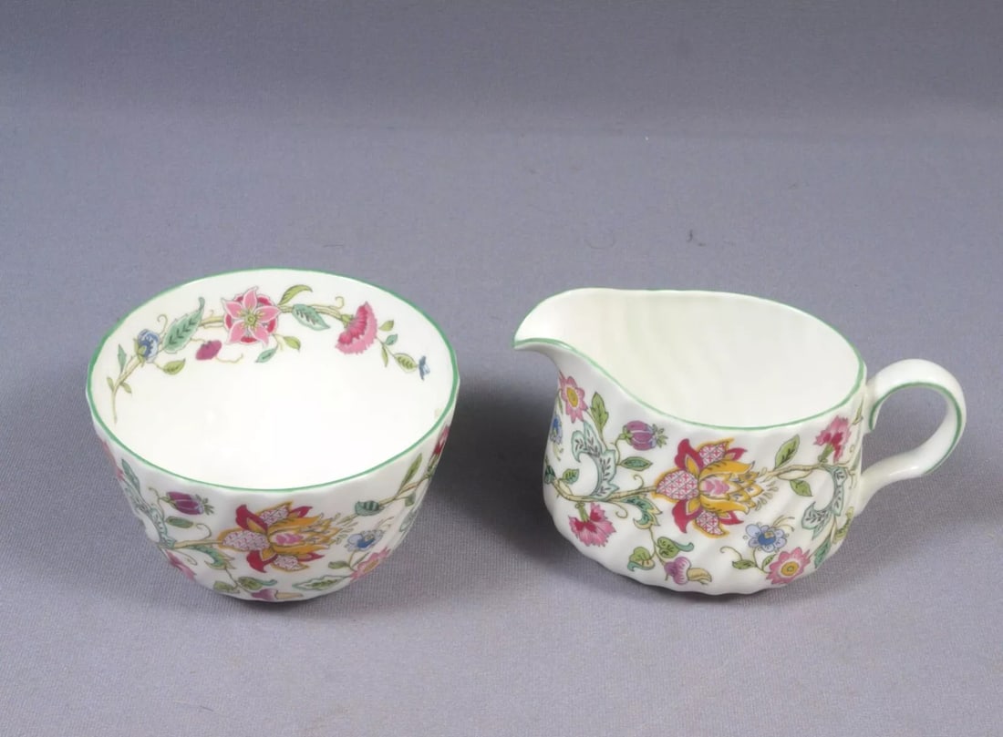 Minton Haddon Hall Creamer Milk Jug Open Sugar Bowl Set Green England: This is a gorgeous Bone China set of Creamer/Milk jug and open sugar bowl from the Haddon Hall pattern by Minton - Made in England. The set is properly marked. It is decorated with pastel flowers on a