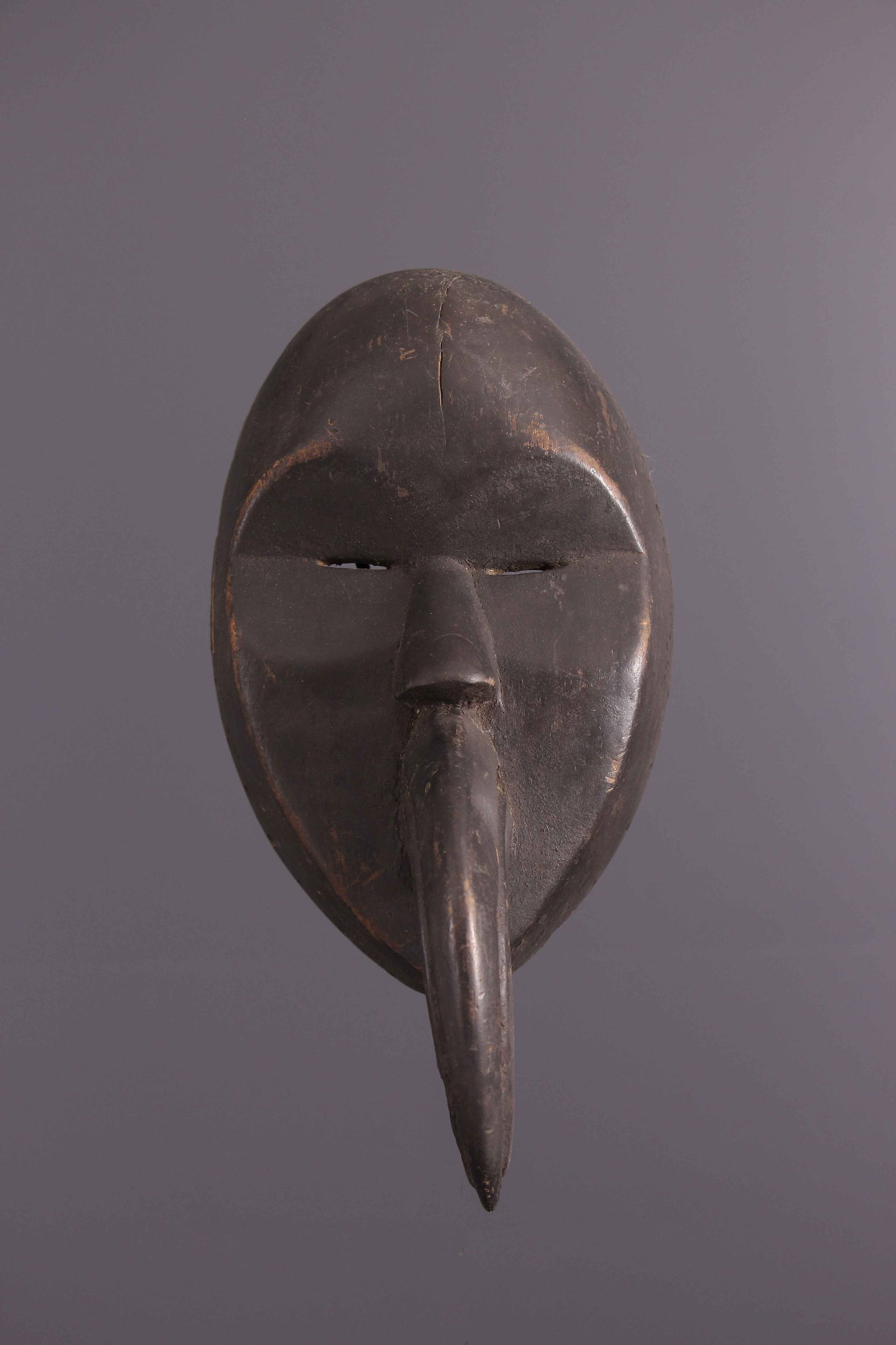 Dan mask - Ivory Coast - African Art Tribal Art: Title: Dan mask - Ivory Coast - African Art Tribal Art Date/Period: Second half XX° Origin: Ivory Coast Dimension: 10,63 Inch Materials: wood Weight: 0,66 Pounds Item type: masks Provenance: Dan 