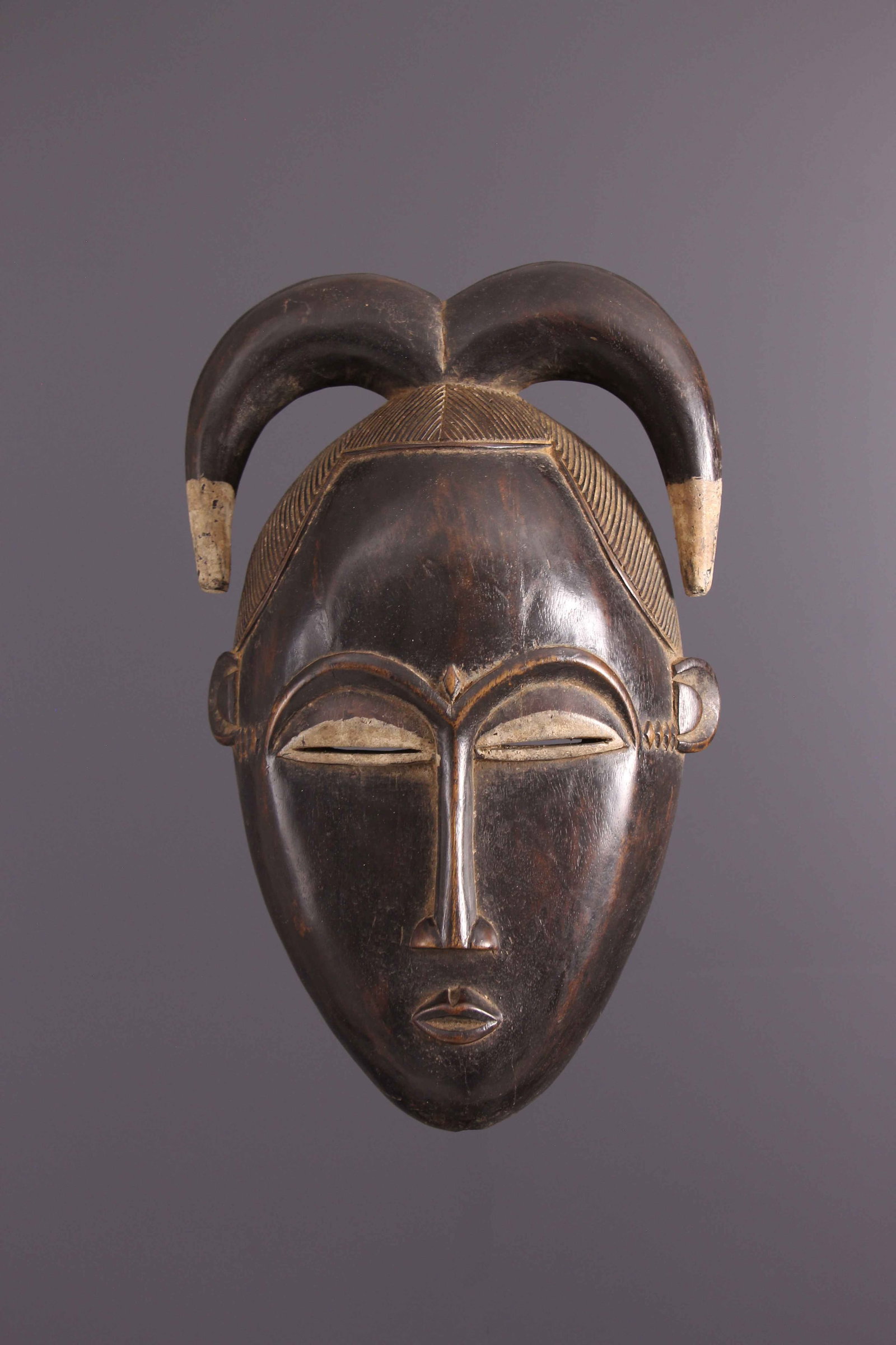 Yohoure mask - Ivory Coast - African Art Tribal Art: Title: Yohoure mask - Ivory Coast - African Art Tribal Art Date/Period: Second half XX° Origin: Ivory Coast Dimension: 12,2 Inch Materials: wood Weight: 2,43 Pounds Item type: masks Provenance: T