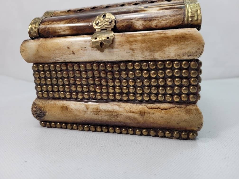 Vintage bone and brass metal decor mini trunk or box with purple lining: Vintage from the 1970s Materials: Metal, Shell Length: 6 Inches; Width: 6 Inches; Height: 5 Inches "Vintage Bone and brass Metal Decor Mini Trunk or Box with Purple Lining In good condition with minor