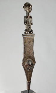 LUBA Kibango Chief's Staff Scepter Congo Drc African Tribal Art Regalia 1282: CONGO DRC SUPERB LUBA CHIEF'S STAFF - SCEPTER - CANE ( KIBANGO ) A kneeling female representation tops this beautiful chef's stick Two faces carved in bas relief adorn the bottom According to Mary