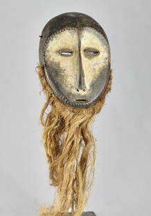Large LEGA Wood idimu African Mask Bwami Cult Congo Zaire DRC Tribal Art 1551: CONGO DRC LARGE LEGA BWAMI IDIMU MASK The contour of the heart-shaped face is hemmed as well as the eye contour The beauty of this mask is accentuated by the kaolin and the long raffia beard Idimu