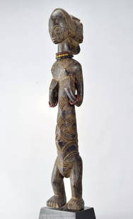 Large LUBA female cult figure statue sculpture Congo African Tribal Art MC 1842: CONGO DRC Large LUBA female statue (53cm) Beautiful classic statue Filiform with a disproportionate trunk and very short legs, the hands are placed under the chest. Numerous scarifications As often,