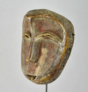 Beautiful KWELE Mask GABON African Tribal Art 1122: GABON Superb KWELE Mask CHARACTERISTICS : TYPE OF OBJECT : Mask ETHNICAL GROUP : Kwele ORIGINE : Gabon MATERIAL : Wood DIMENSIONS : About 9 inches high CONDITION : BAD Reserve: $200.00 