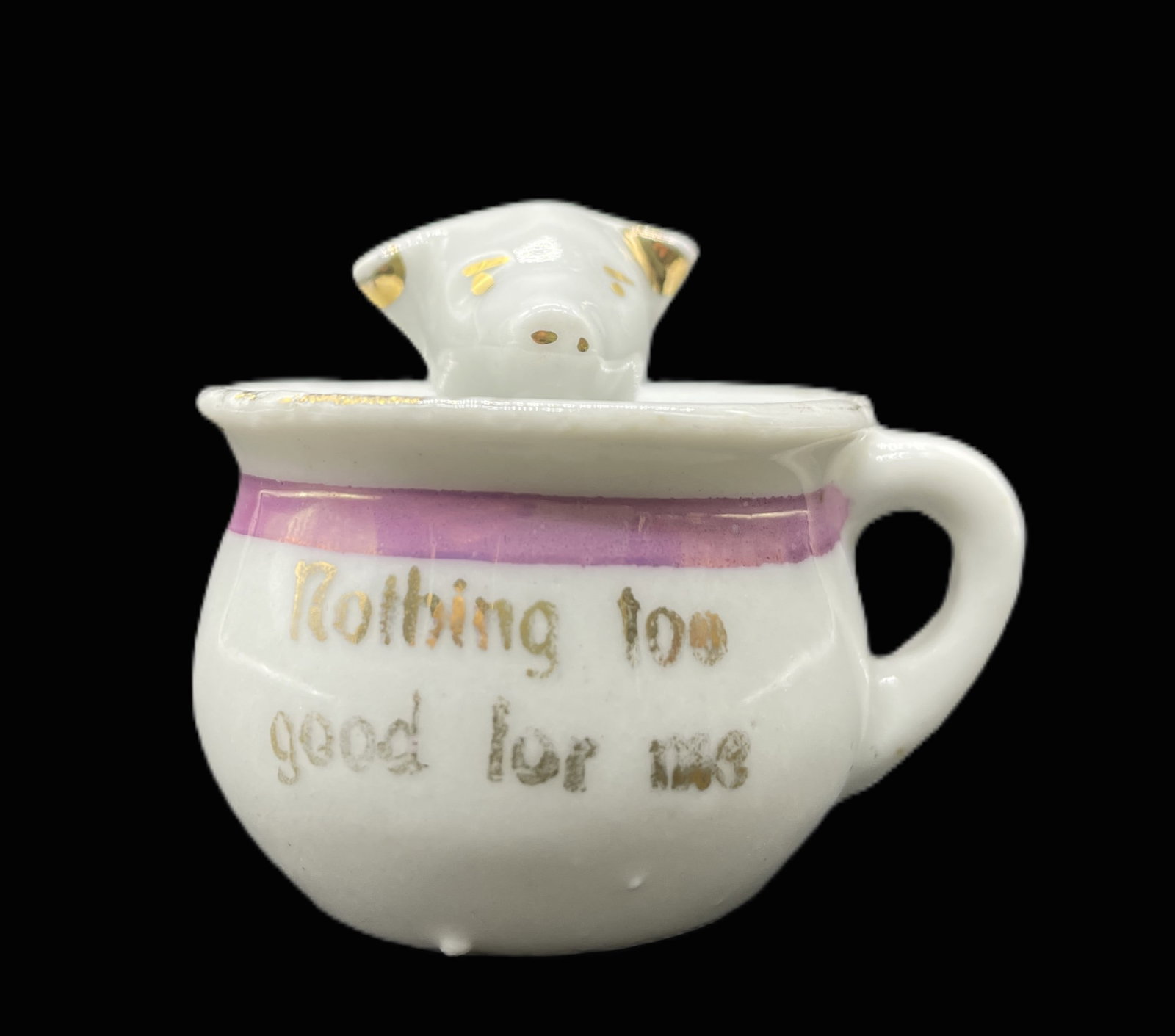 ANTIQUE GERMANY FAIRING PIG FIGURINE IN CUP: Title: ANTIQUE GERMANY FAIRING PIG FIGURINE IN CUP Date/Period: unknown Dimension: APPROX 1.75 Material: PORCELAIN CERAMIC Additional Information: ANTIQUE GERMANY PORCELAIN PINK PIG FAIRING FIGURINE M