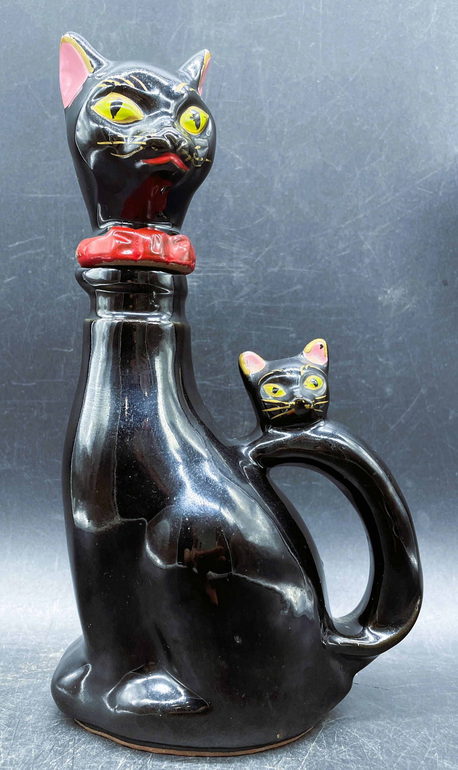 1950'S JAPAN REDWARE BLACK CAT DECANTER W/ KITTEN HANDLE: Title: 1950'S JAPAN REDWARE BLACK CAT DECANTER W/ KITTEN HANDLE Date/Period: approx. 1950's Dimension: approx 8.5 x 5 x3 Material: pottery Additional Information: 1950'S JAPAN REDWARE BLACK CAT DECANT