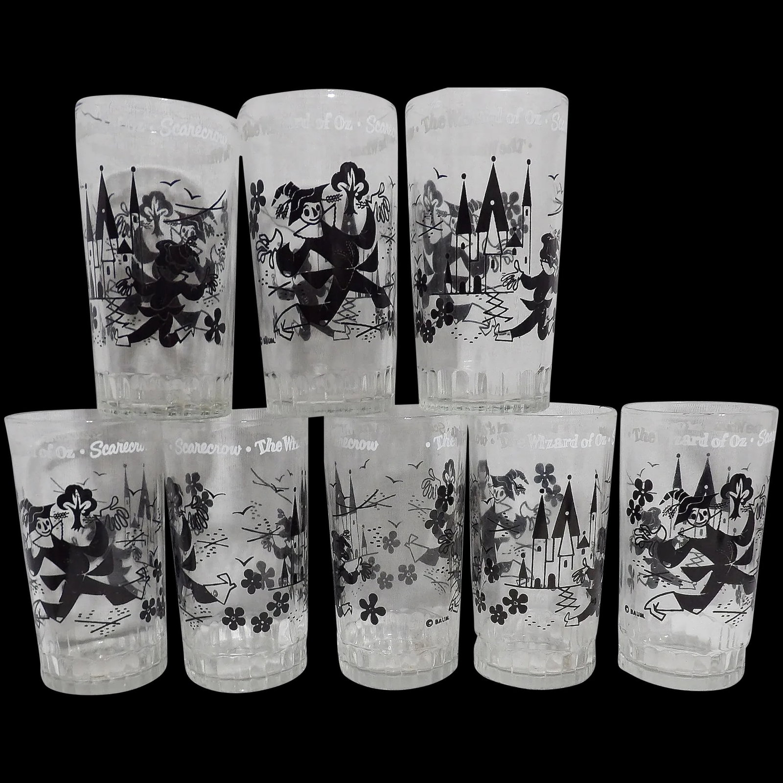 Vintage MCM Wizard Of Oz - 1950’s -Baum Black Scarecrow Glasses: This set of 8 Vintage MCM Wizard Of Oz - 1950’s - Baum - Black Scarecrow Glasses are in excellent condition. NO nicks, or loss of pyro color. NO stains and marked on the bottom with letters and