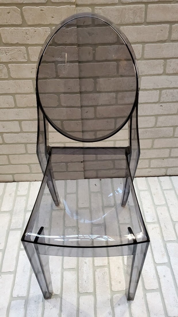 Victoria Ghost Smoke Chair by Philippe Starck for Kartell: Materials: plastic, lucite Victoria Ghost Smoke Chair by Philippe Starck for Kartell H 35.5" W 15" D 15" Seat H 18.5" Great vintage condition Reserve: $361.00 Shipping: Domestic: Shipping