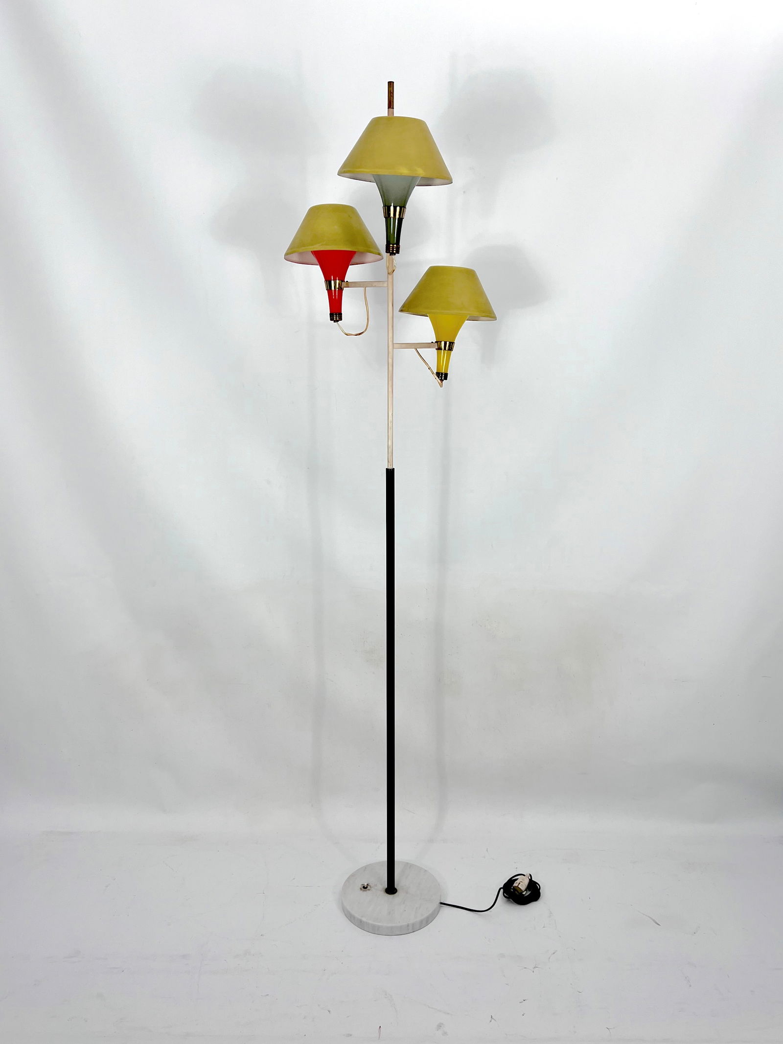 Mid-century Modern three arms floor lamp by Stilux Milano. Italy 1950s: Rare three arms floor lamp produced by Stilux Milano during the 50s. Marble base with lacquered metal stem and brass details. Three arms with colored murano glass light diffusers and lacquered aluminu