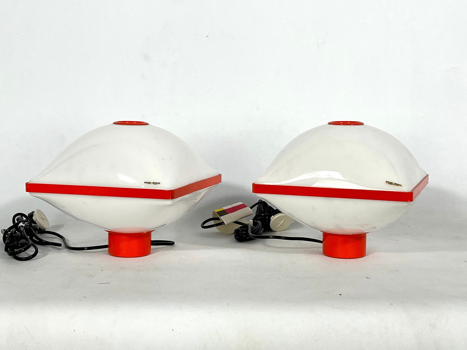 Space Age set of two table lamps by Stilux Milano. 1970s: Great vintage condition with small trace of age and use for this set of plastic and metal space age table lamp produced in Italy by Stilux Milano. Labeled and tag of manufacturing. Model Bulgaria. Ful