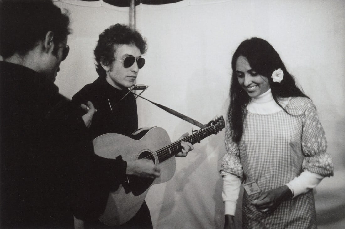JIM MARSHALL - Bob Dylan, Joan Baez at Newport 1964: Artist: Jim Marshall Title: Bob Dylan And Joan Baez Backstage At Newport, 1964 Medium: Photo Litho, 2009, China Dimensions: 7.95x5.3" Description: Heat Wax Mounted on 8.5x11" Conservation Board Artist