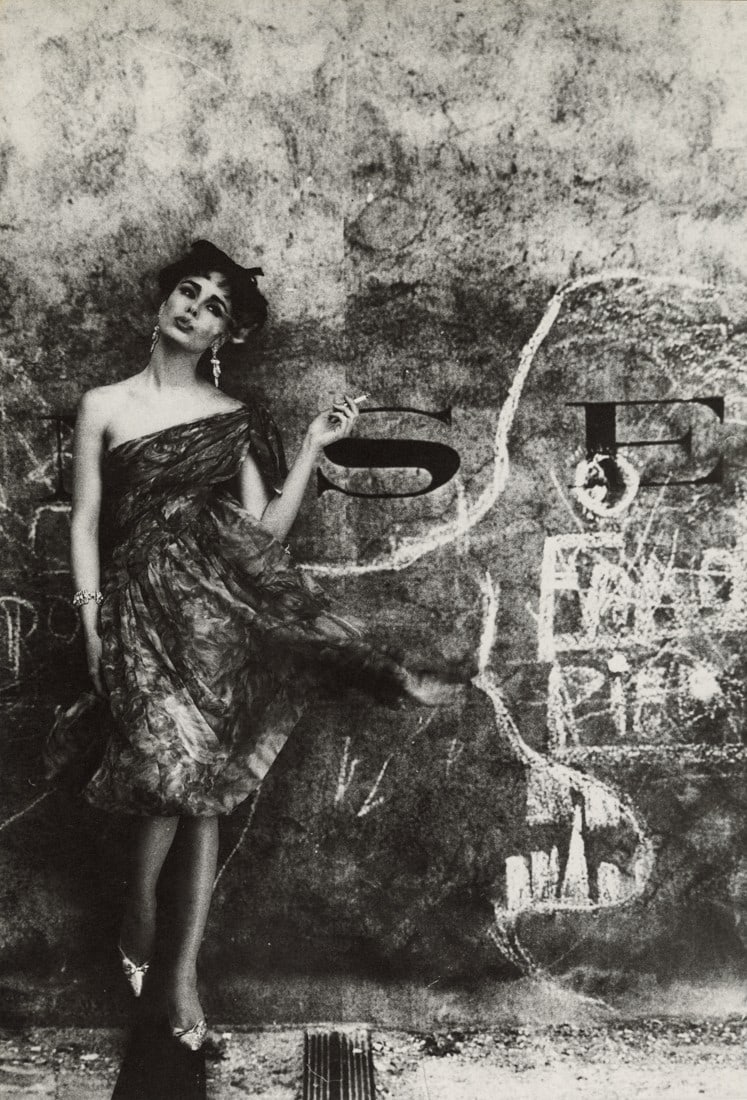 WILLIAM KLEIN - Model, Photographic Background, 1966: Artist: William Klein Title: Model and Photographic Background, 1966 Medium: Photo Litho, 1983, USA Dimensions: 8.3x12.25" Description: Heat Wax Mounted on 12x16" Conservation Board Artist Bio: Willia