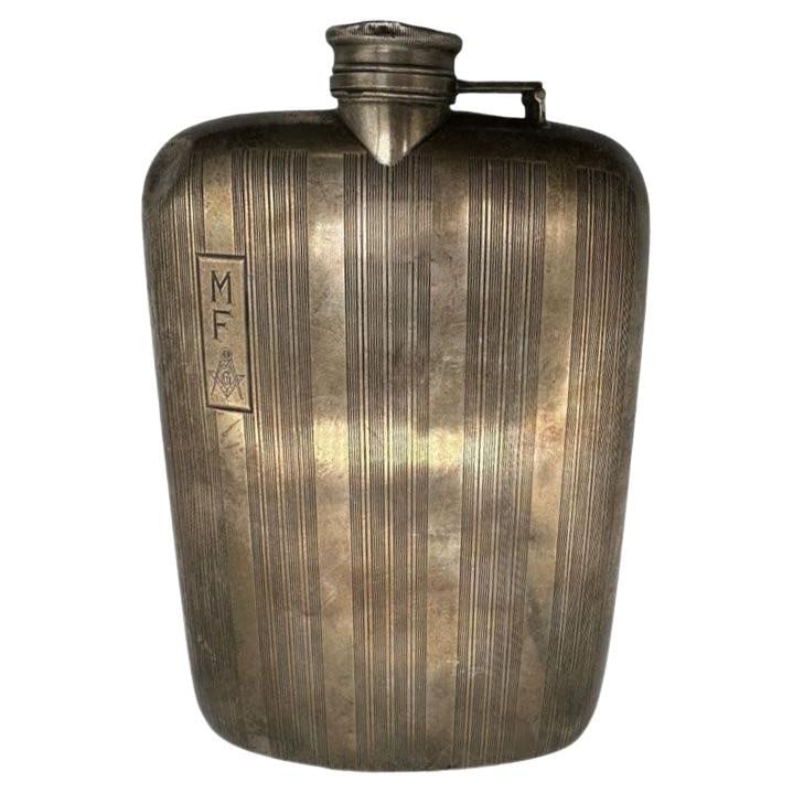 Sterling Silver Free mason Prohibition Hip Flask by Elgin E.A.M.: About the Item This Antique Liqueur Prohibition Era Free mason Sterling Silver Hip Flask. Curved hip flask featuring alternating etched stripes and a smooth polished finish stripe on the front, a smoo