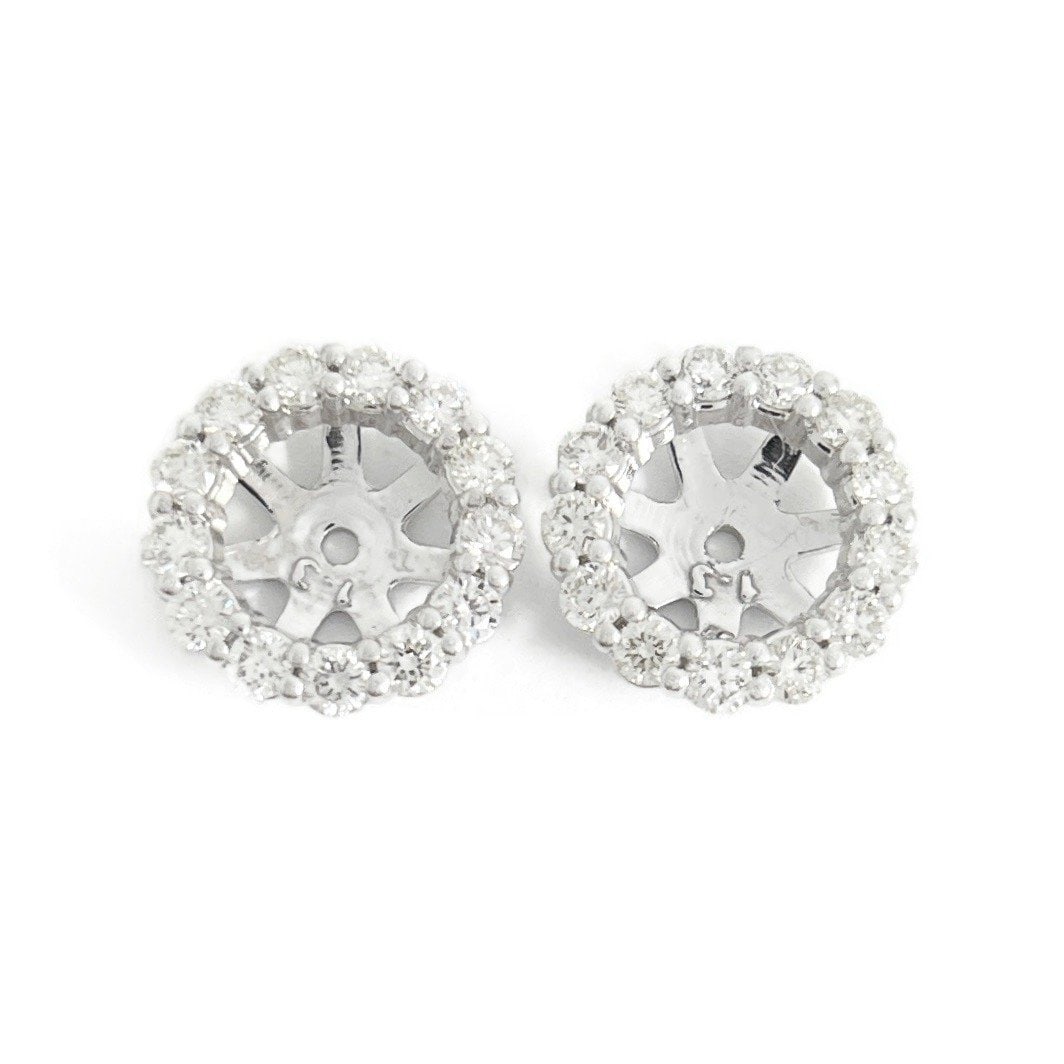 Round Diamond Halo Jackets: Stud Size: for studs 2.50 ctw (1.25 ct each); 7 - 8 mm pearls Diamonds: 26 round brilliant cuts .80 ctw, I-J, VS2 Metal: 14K white gold Weight: 2.12 grams Stamped: NA (x-ray tested) Diameter: 11 mm No