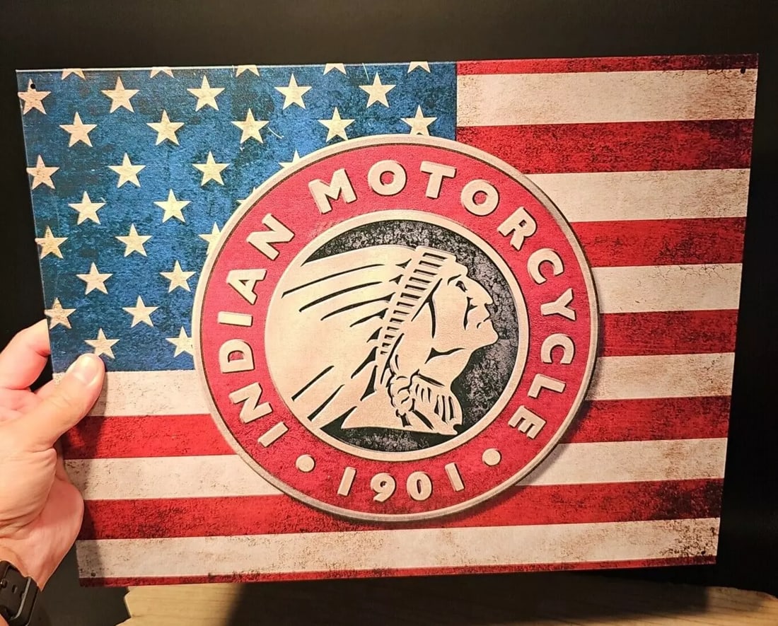 Indian Motorcycle Sign American Flag: 16" x 12 1/2" Such a neat reproduction metal Vintage Style Indian motorcycle sign. Great decorative piece. Reserve: $20.00 Shipping: Domestic: Flat-rate of $10.00 to anywhere within the contiguous U.S