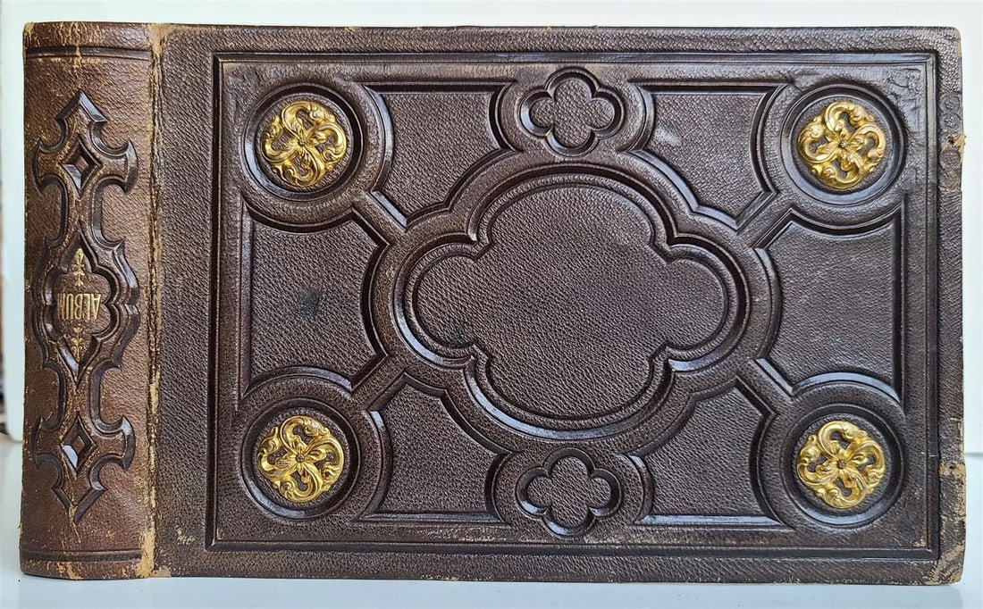 19th century VICTORIAL PHOTO ALBUM antique 6 1/4 by 9 1/4": Size 6 1/4 by 9 1/4" Good interior condition, worn binding Gilt edge. Lacks clasps 5 antique CDV photos are included. Reserve: $47.00 Shipping: Domestic: Flat-rate of $25.00 to anywhere within the con