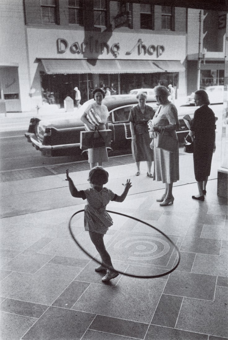 COSTA MANOS - Hula Hooper, South Carolina, 1958: Artist: Costa Manos Title: Hula Hooper, Columbia, South Carolina, 1958 Medium: Photo Litho, 1985, USA Dimensions: 5.75x8.6" Description: Heat Wax Mounted on 8.5x11" Conservation Board Artist Bio: Rese