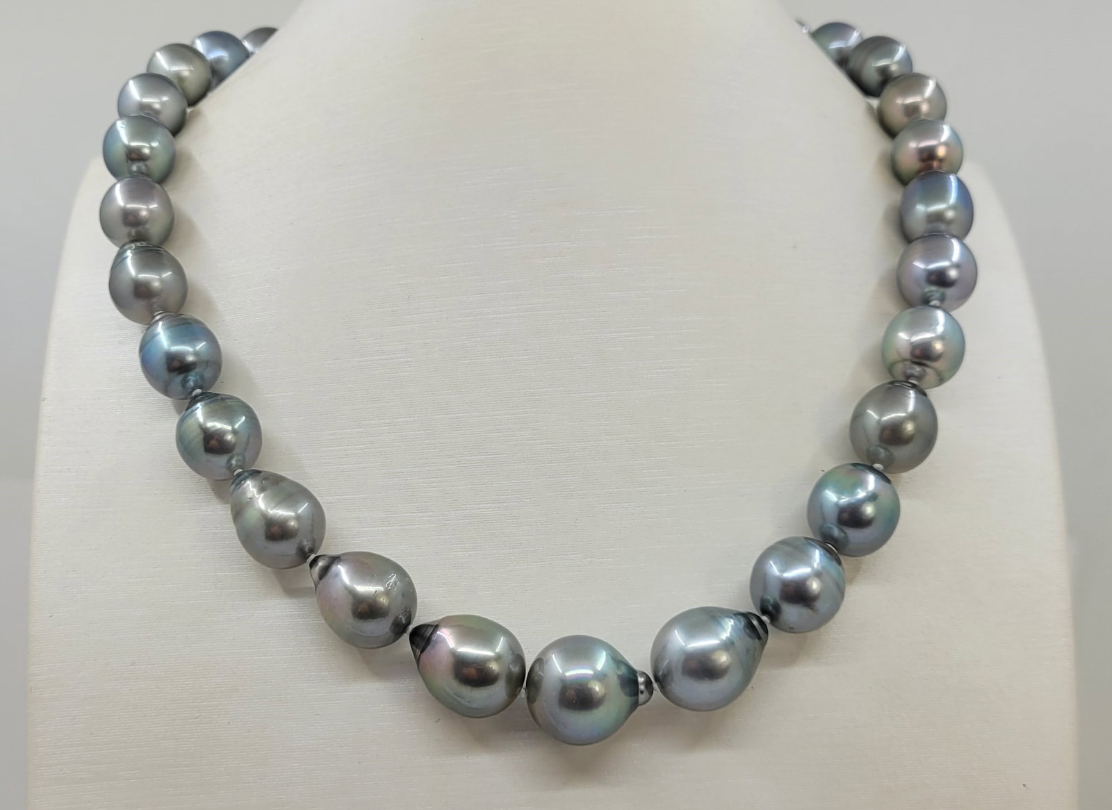 Necklace - ALGT Certified 11.0x13.7mm Large Rainbow Peacock Tahitian Pearls: Title: Necklace - ALGT Certified 11.0x13.7mm Large Rainbow Peacock Tahitian Pearls Description: Emerging from the warm oceans of French Polynesia, these pearls have been hand selected for their top qu