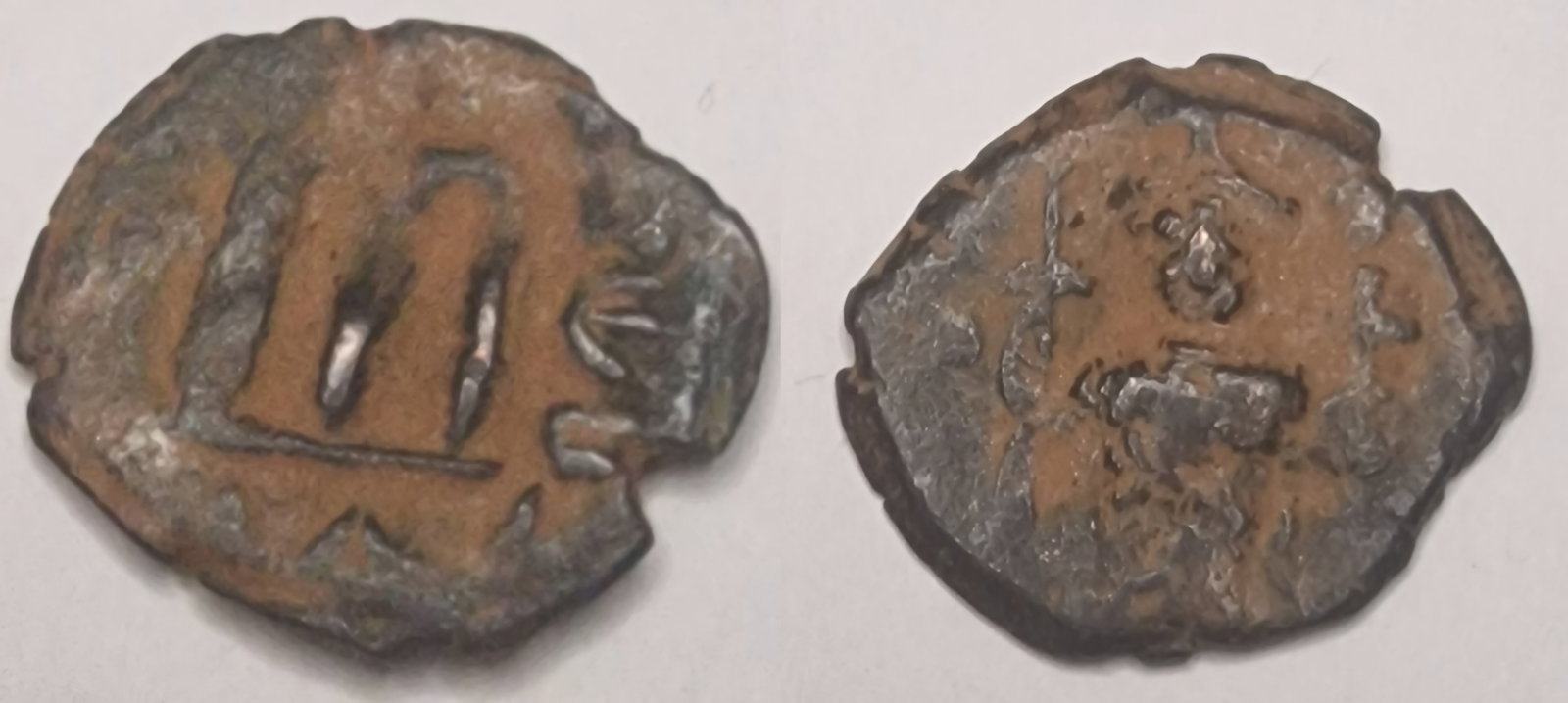 The Byzantine Empire: Title: The Byzantine Empire Description: ISLAMIC Umayyad Caliphate Fals Hims (Emesa) Circa 680s Arab-Byzantine Date/Period: 680 Materials: bronz coin Dimensions: 18.1 mm Reserve: $8.00 Shipping: