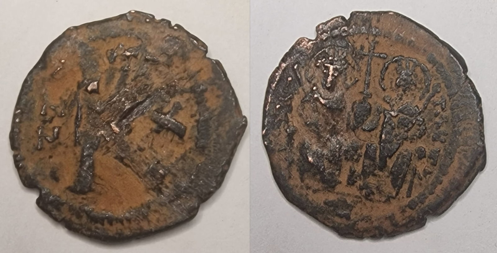 The Byzantine Empire: Title: The Byzantine Empire Description: Justin II and Sophia Date/Period: 578 Materials: bronz coin Dimensions: 23.4 mm Reserve: $10.00 Shipping: Domestic: Flat-rate of $15.00 to anywhere within