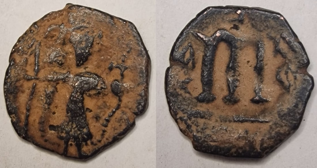 The Byzantine Empire: Title: The Byzantine Empire Description: Beardless Constans II standing facing, wearing crown surmounted by cross, holding long cross in his right hand and globus cruciger in his left. Date/Period: 64