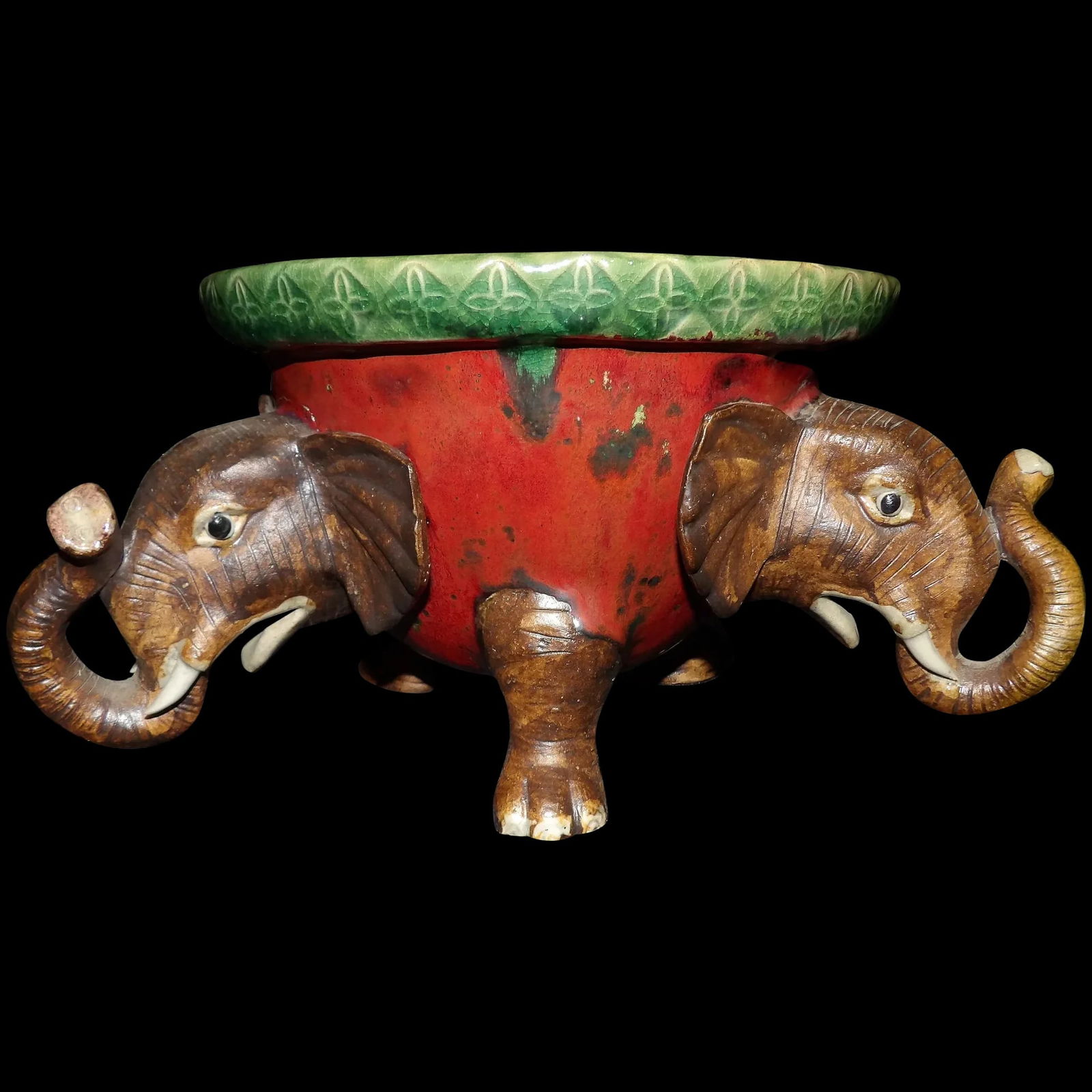 Antique Asian Pottery Elephant Planter: This Antique Asian Pottery Elephant Planter is in Excellent condition. It is marked on the bottom with what appears to be Chinese impressed mark. I did not have a reference for the mark. I will sugges