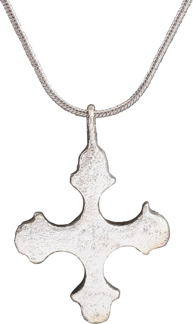 MEDIEVAL CHRISTIAN CROSS, 10th-12th CENTURY: Silvered bronze, about 1 1/4” height including the suspension loop. Symmetrical with the cross beam centered and each beam terminal as a trefoil, crossed in the Jerusalem Cross fashion used thro