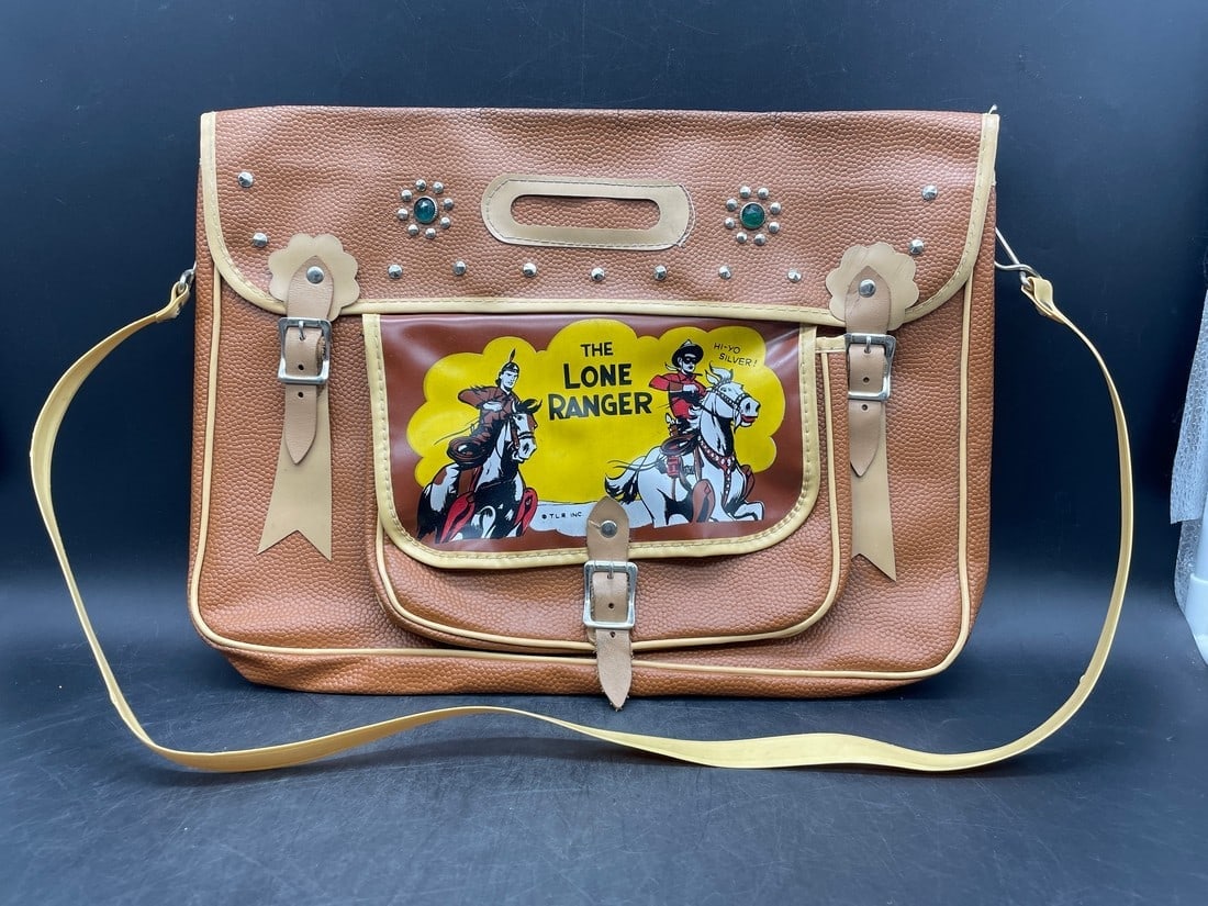 1950'S LONE RANGER SADDLE BAG ORIGINAL WITH SHOULDER STRAP: Title: 1950'S LONE RANGER SADDLE BAG ORIGINAL WITH SHOULDER STRAPDate/Period: approx 1950'sDimension: approx 14.25 x 10.25 not including strapsMaterial: vinyl or synthetic leather look materialAdditio