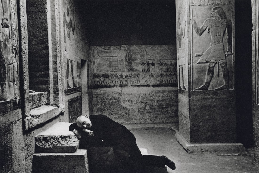DUANE MICHALS - Self Portrait Asleep in Tomb, 1978: Artist: Duane Michals Title: Self Portrait Asleep in the Tomb of Mereruka at Sakkara, 1978 Medium: Sheet Fed Gravure, 1988, Japan Dimensions: 8.95x6" Description: Heat Wax Mounted on 8.5x11" Conservat