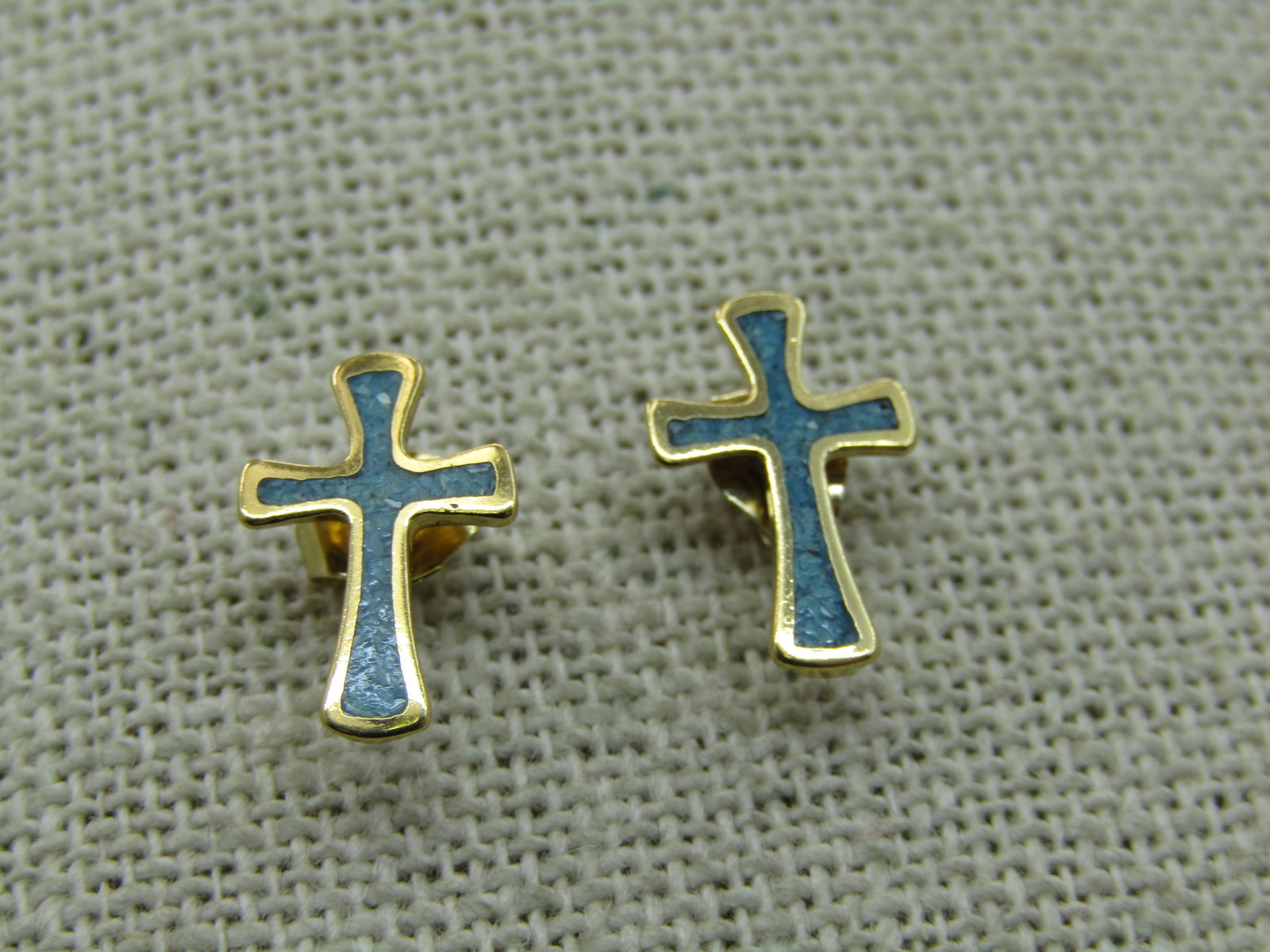 Vintage Southwestern Inlaid Turquoise Chip Cross Earrings, Pierced 10kt GF: Vintage Southwestern 10kt GF Inlaid Turquoise Chip Cross Earrings, Pierced. The earrings are slightly over 1/2" tall and 1/3" wide. They test at 10kt as gold filled or plated. They are a nice quality.