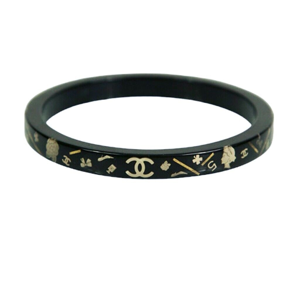 CHANEL CC Logo Bangle Bracelet In Black Resin with iconic symbols embedded (1 of 8)
