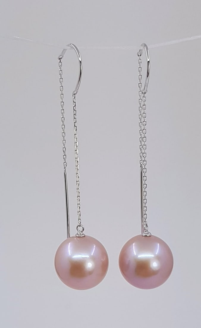 Earrings - 18 kt. White gold - 11x12mm Edison Pearls: Title: Earrings - 18 kt. White gold - 11x12mm Edison Pearls Description: Produced by the Hyriupsis Cumingi oyster in the warm waters of Southeast Asia, these pearls were hand selected for their natura