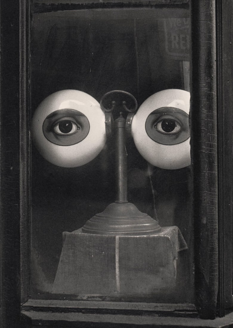 IRVING PENN - Optician's Shop Window, New York, 1939: Artist: IRVING PENN Print Title: Optician's Shop Window, New York, 1939 Medium: Quad-tone Photoengraving Printed 1980’s in the US Image size (inches) approx.10 x 7” Irving Penn was an Amer