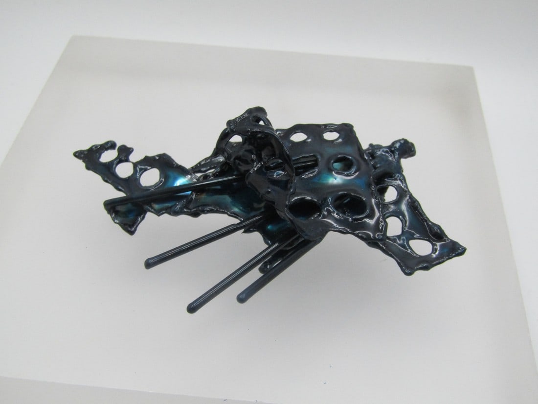 Enameled Mod Brooch, Hand Made, Tiered Brutalist. 3" by 1.75": Enameled Mod Brooch, Hand Made, Tiered Brutalist. 3" by 1.75". Design with open areas in teal, blue, black as well as four ray-like bars, tiered. This is by David Wright of Oregon. Chrome plated sheet