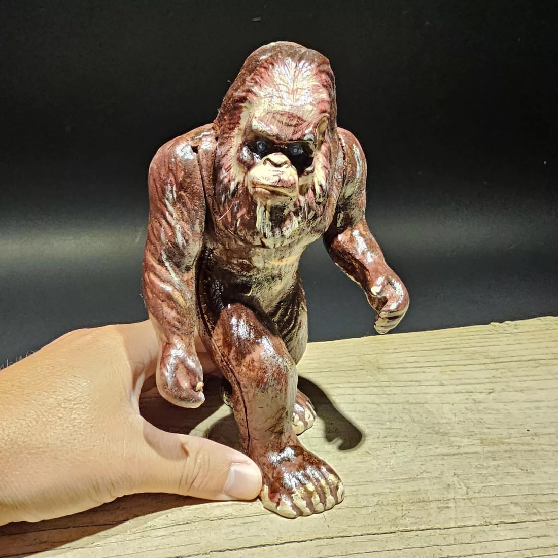 7 1/2" Cast Iron Big Foot Sasquatch Coin Bank: 7 1/2" Tall Great reproduction cast iron coin bank. All cast iron hand painted, slightly distressed as shown in the images. Certainly looks old! Reserve: $40.00 Shipping: Domestic: Flat-rate of $25.00