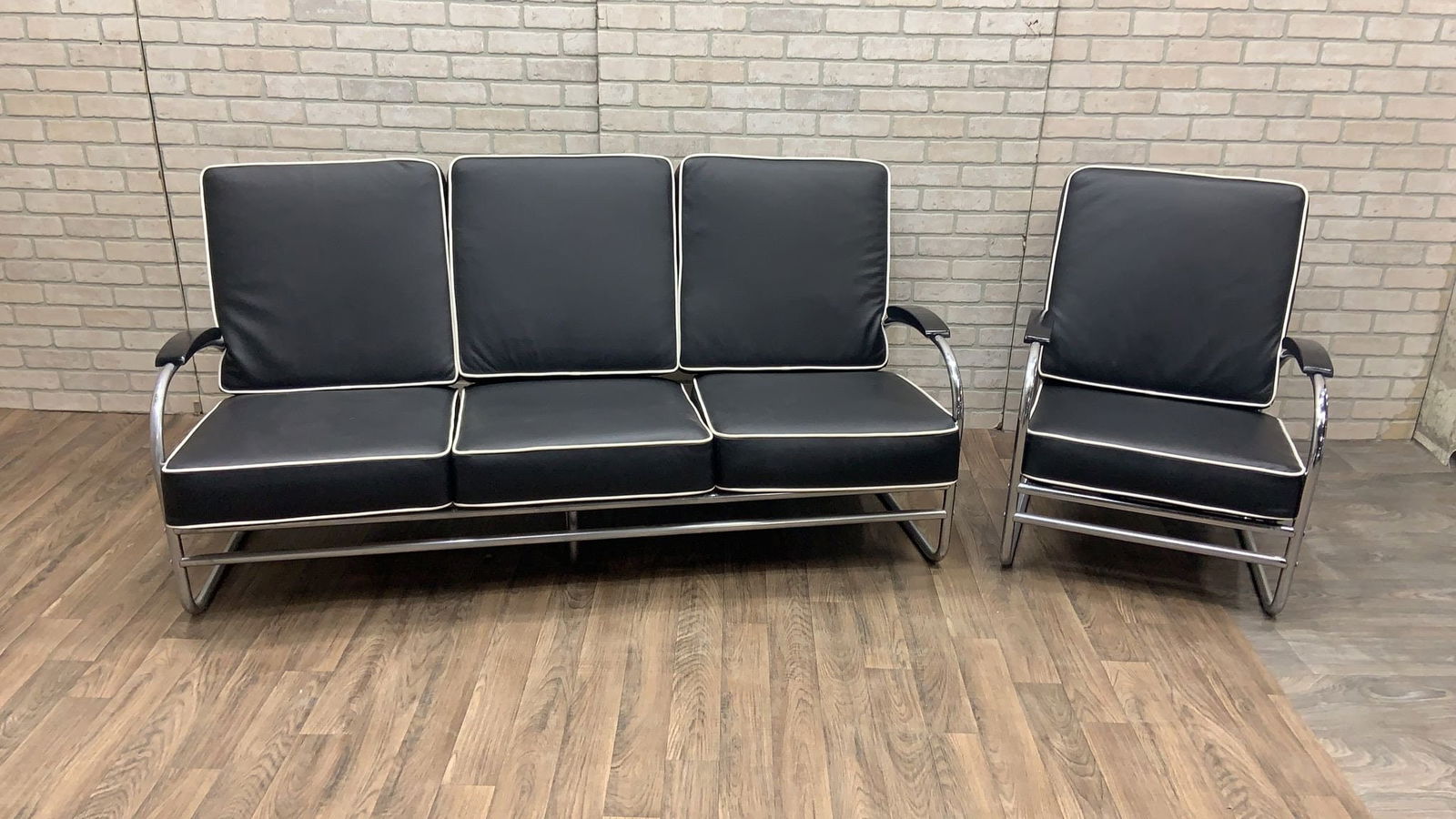Art Deco Chrome Tubular Sofa & Lounge Chair Set in Black Leather Set of 2: Vintage from the 1930s Ships from Illinois! Shorter shipping distances are kinder to the planet Ordering items closer to you is more likely to reduce your purchase's carbon footprint. Read the full de