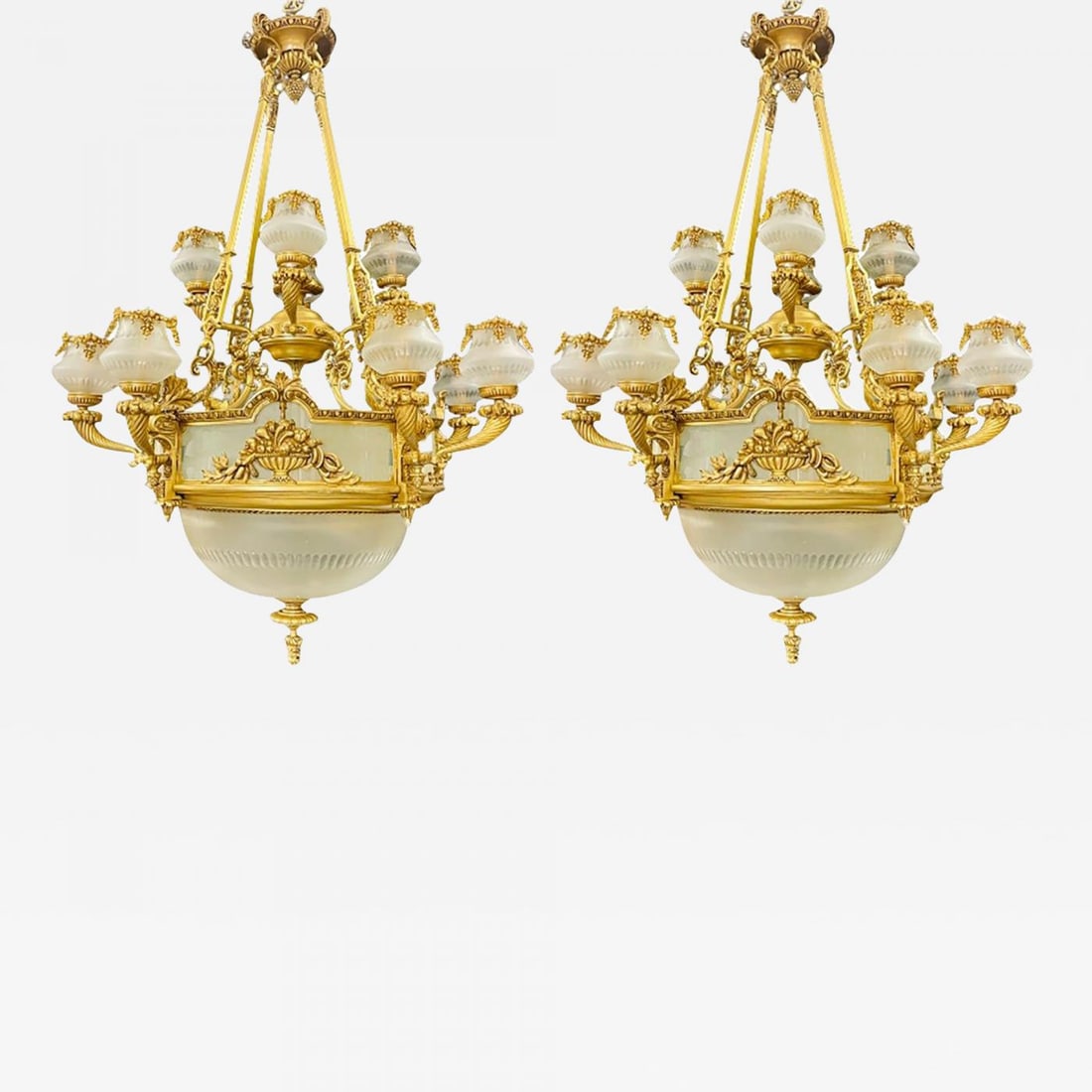 Pair of Louis XVI Style Bronze Chandeliers: Title: Pair of Louis XVI Style Bronze Chandeliers Description: Pair of Louis XVI style bronze chandeliers. A large and impressive palatial pair of gilt bronze chandelier having 13 lighted arms with fo