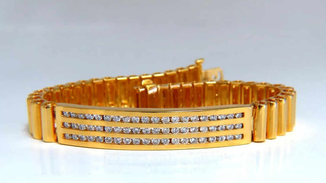 2.00ct Round Diamonds ID Tag Bracelet 14 karat Channel Three Row Smoothed Bar: Smooth Concave Link ID Tag Bracelet Durable, Well Made 2.0ct Natural Diamonds Rounds, Full cuts H-color Si-1 clarity. 14kt. yellow gold 8 inch long 10mm wide id bar 14kt. yellow gold 50.1 Grams $5000