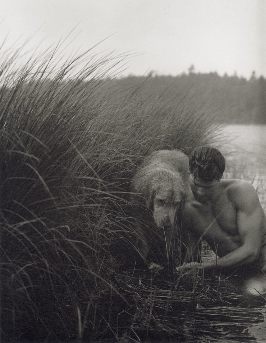 BRUCE WEBER - Rob and Little Bear, Bear Pond, 1989: Artist: Bruce Weber Title: Rob and Little Bear at the Island on Bear Pond, 1989 Medium: Sheet Fed Gravure, 1990, USA Dimensions: 7.3x9.35" Description: Heat Wax Mounted on 11x14" Conservation Board Ar