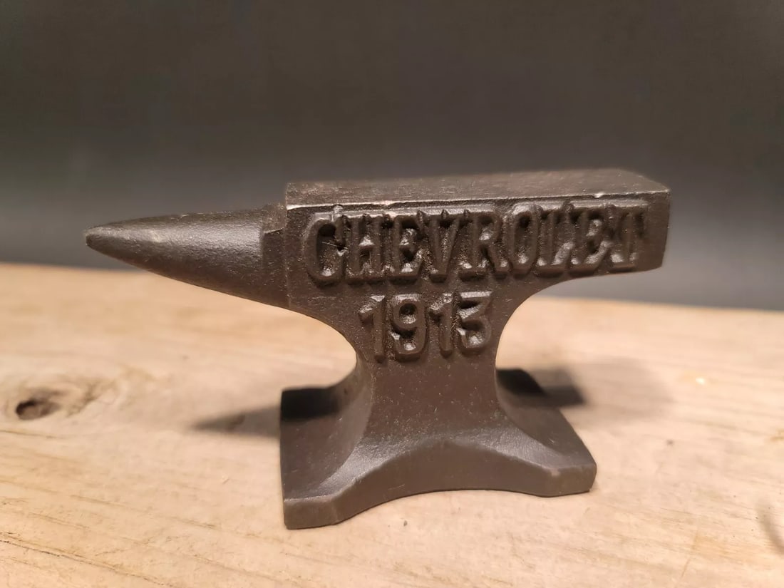 Cast Iron Chevrolet Miniature Anvil: 4 3/4" long x 2 1/2" Tall x 1 3/4" Wide 1 lb. 5 oz. A wonderful reproduction cast iron collectible Chevrolet advertising piece. Advertising pieces like this many times were given to shops or used as s