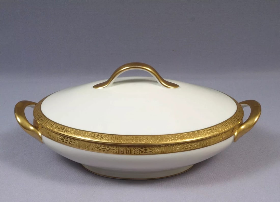 Raynaud T&V Tressemanes Vogt LIMOGES GOLD Encrusted Serving Bowl Tureen NYC: This is a rare and gorgeous one Oval Covered Serving Bowl/Tureen. The bowl was made in France LIMOGES by T&V Tressemanes Vogt. Porcelain factory partnered by Gustave Vogt and Émilien de Tressemanes. 