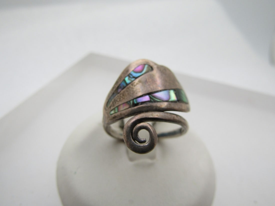 Vintage Stering Inlaid Abalone Taxco Ring, Adjustable, Mexico: Vintage Stering Inlaid Abalone Taxco Ring, Adjustable, Mexico. Bypass design with a wide side that has two angled inlaid abaloen sections and a coiled other wise. Adjustbable from sz. 6 to appx. 10 - 