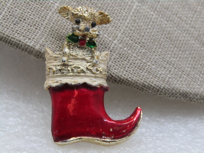 Vintage Gerry's Christmas Poodle Stocking Brooch, Mid-Century: DescriptionVintage Gerry's Christmas Poodle Stocking Brooch, Mid-Century. Cute little silver tone poodle popping out of the red and white enameled Christmas stocking - he is wearing a green and red ho
